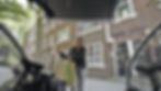 Woman accessing easy-to-use secure outdoor bicycle storage unit