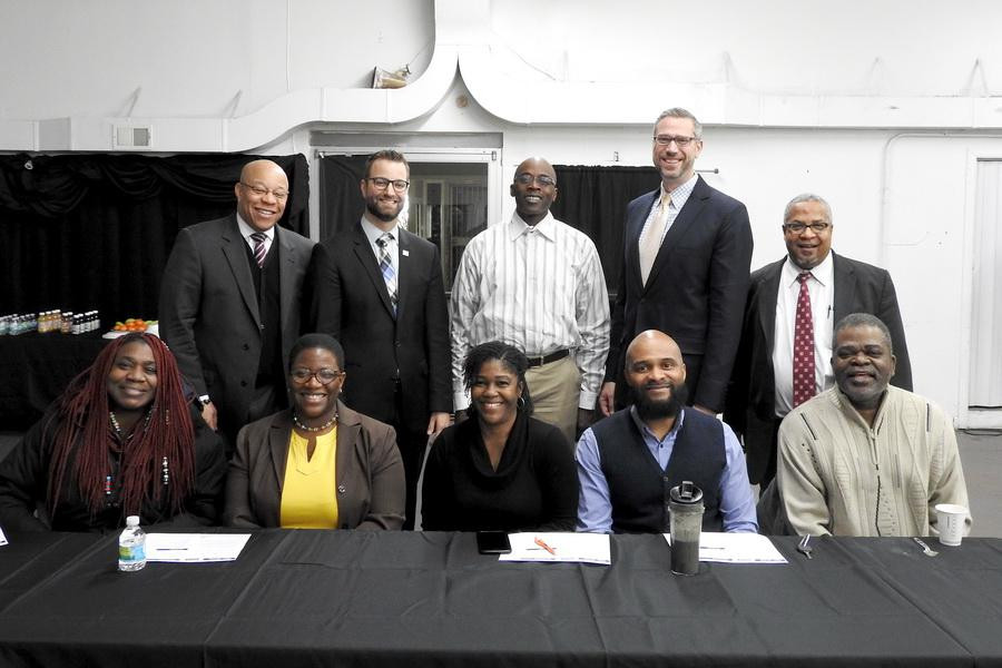 Members of Just Christ Ministries and local clergy met with State Treasurer Michael Frerichs in February.