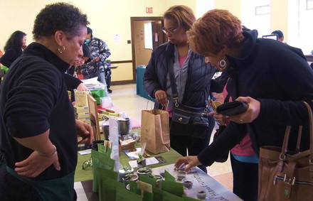 Lori Watts-Branch, Owner of SenTEAmental Moods at a Faith in Place Winter Farmers Market.