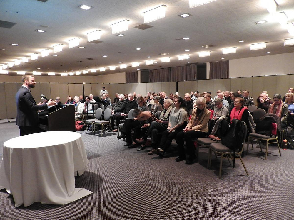 Rev. Brian Sauder, President & Executive Director of Faith in Place, speaks to the audience.