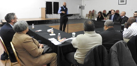 Pastor Wright shares his experience with fellow faith leaders.