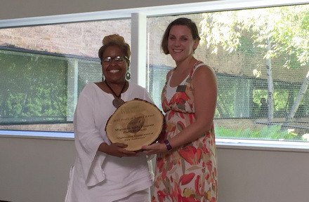 Rev. Debra Williams, receives the Force of Nature Award from Chicago Wilderness