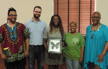 Judge Maryam Ahmad receives gifts after her migration story.