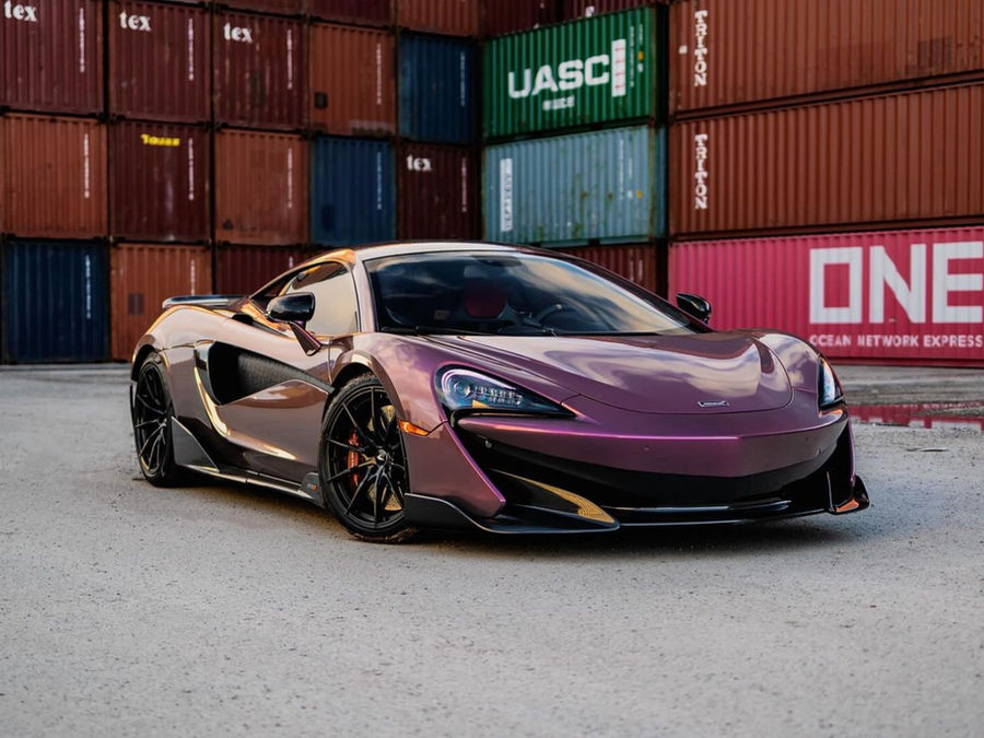 Vehicle wrapped in Gold Rose Metallic