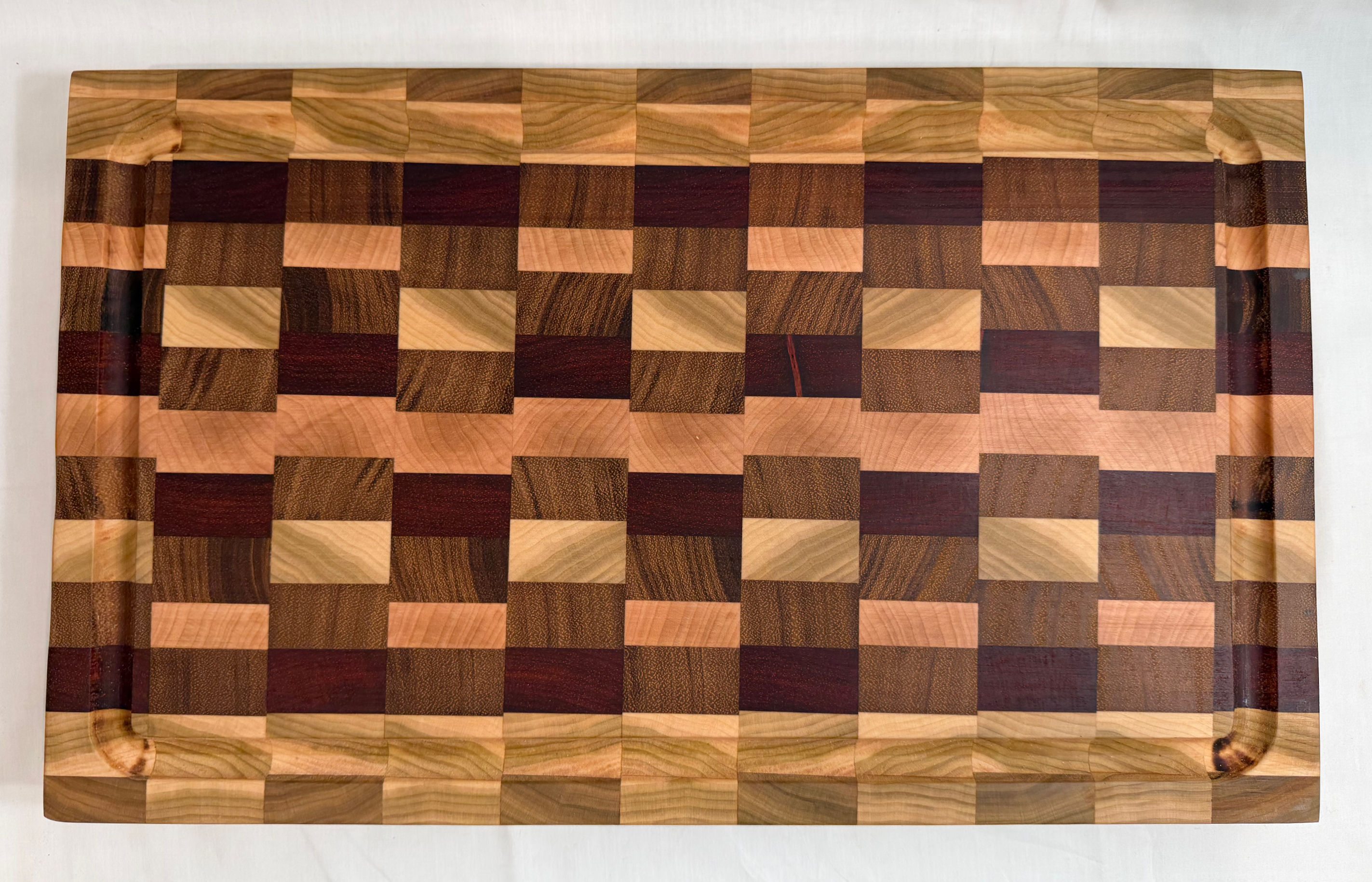 Black Limba, African Teak, Padauk & Cherry Wood Cutting Board