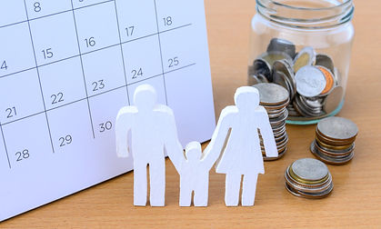 vecteezy_white-icon-family-and-coins-on-calendar-family-concept_7182404.jpg