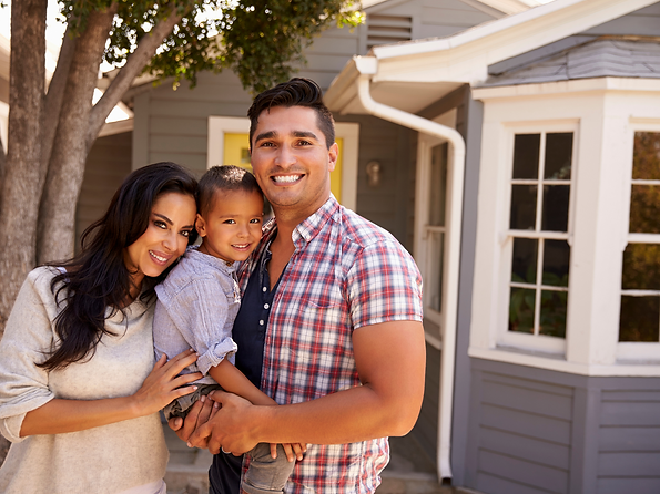Latino Family Outside Home.png