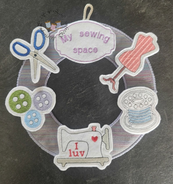 Thumbnail: Sewing wreath & a 6" wreath hoop. Embellishments 4"x4" hoop. Wreath 5"X7" hoop