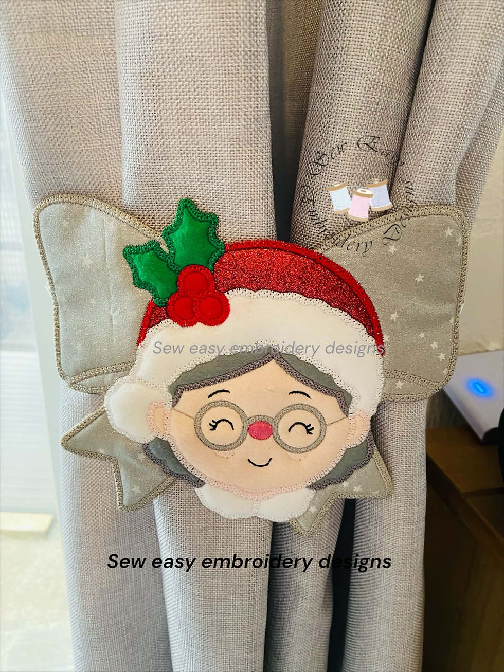 Thumbnail: Santa & Mrs Claus curtain/chair ties. ITH applique project, photo instructions