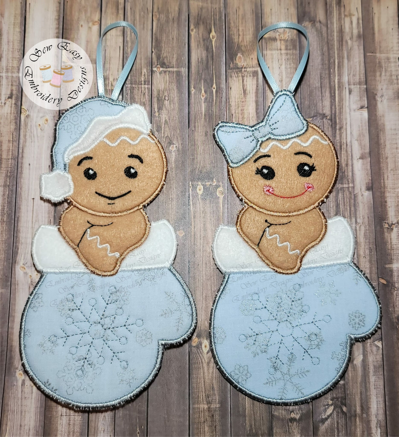 Gingerbreads in mittens, boy and girl