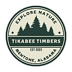 Tikabee Timbers round logo with tree and tag line that says Explore Nature Mentone Alabama