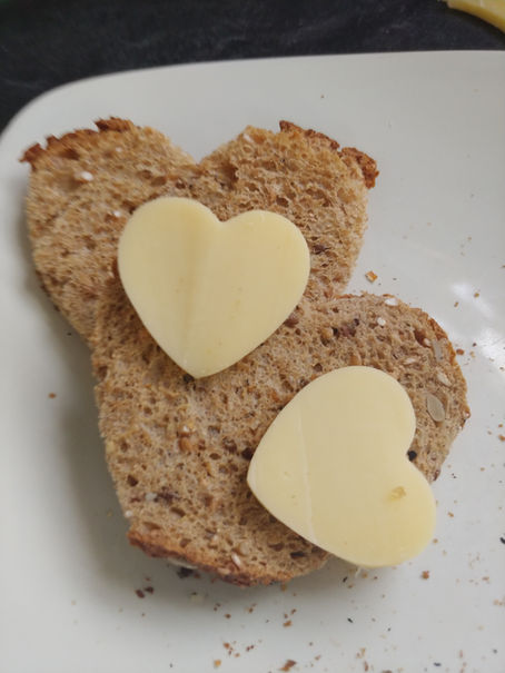 heart shaped cheese on heart shaped bread