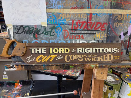 Custom Hand-Painted Saw Lettering "The Lord Is Righteous; He Has Cut The Cords Of The Wicked - Psalm 129.4" by Los Angeles Trade Tech Sign Alumni Hand-Painted Sign Artist Alex Kurakake of Smart Alex Hand-Painted Signs Orange County Hand-Painted Signs Company Southern California Sign Painting Workshops