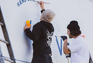 Belmont Shore Barber Co. Storefront Hand-Painted Wall Logo Sign by Sign Artist Alex Kurakake at Smart Alex Hand Painted Signs Orange County Sign Company Premium Sign Solutions West Los Angeles Irvine Los Angeles Newport Beach Anaheim Southern California