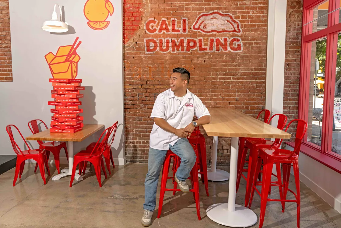 Orange County Restaurant Business: Interior Storefront Custom Hand-Painted Brick Wall Signage for Cali Dumplings in 149 N Glassell St, Orange, California 92866 by Hand-Painted Sign Artist Alex Kurakake of Smart Alex Signs. Los Angeles Premium Hand-Painted Sign Solutions Company. Call: 714-515-6205