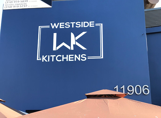 Westside Kitchens Exterior Storefront Hand-Painted Wall Signage by Sign Artist Alex Kurakake of Smart Alex Signs - Orange County Hand-Painted Sign Company. Sign Hand-Painted at 1920 McKinney Ave. Dallas, TX. Los Angeles Premium Hand-Painted Sign Solutions Company. Call: 714-515-6205