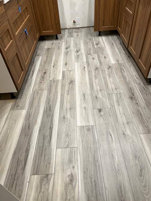 BEFORE PHOTO: Client's Kitchen Vinyl Floors Installed by previous contractor in her West Los Angeles Home. Five Star Vinyl Flooring Replacement Installation Yelp Review from Eiko O. of Los Angeles for ELITE Floor Covering - Best Kept Secret of Quality Floors. Southern California Flooring & Restoration Company near Orange County, South Side, Riverside, Inland Empire. Call 310-912-3045