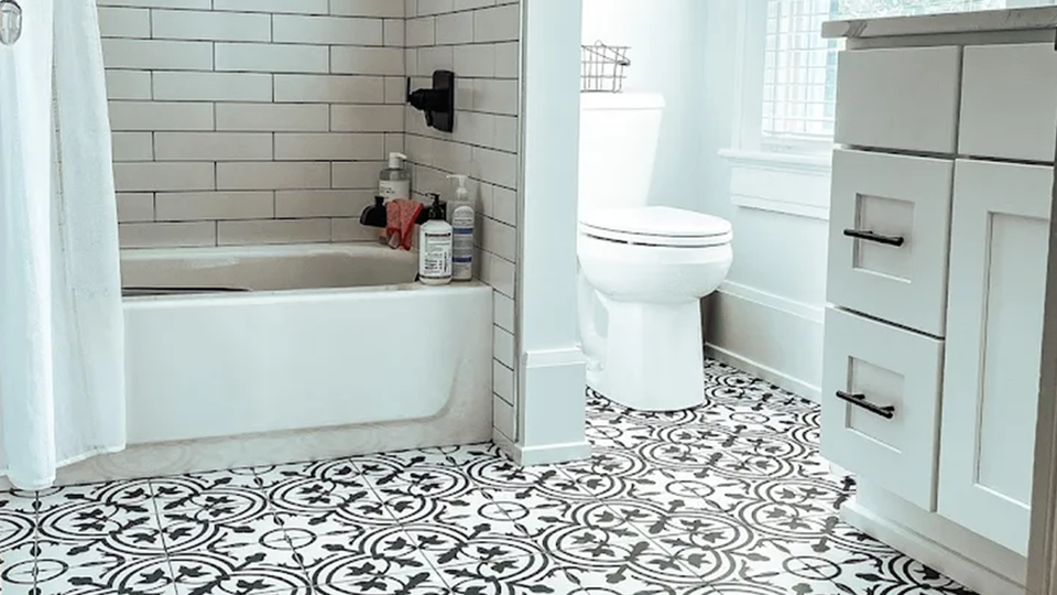 A beautifully remodeled bathroom floor and shower in Sarasota.