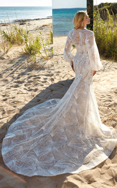 Nude mermaid wedding gown with ivory sequin embroidery, bishop sleeve jacket, bride at beach with mirrors