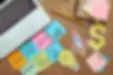elevated-view-of-paper-stickers-with-business-plan-2023-11-27-04-49-01-utc.webp