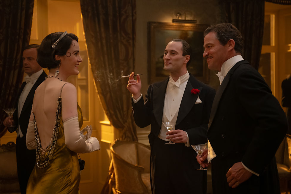Michelle Dockery stars as Lady Mary, Arty Froushan as Noël Coward and Dominic West as Guy Dexter in DOWNTON ABBEY: The Grand Finale, a Focus Features release. Photo Credit: Rory Mulvey