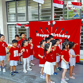 Kids celebrate Singapore’s National Day with a joyful performance.