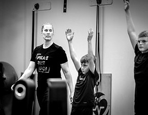 Owner and Head Performance Director Laura Baden supervising Pittsburgh area athletes in youth athlete strength and conditioning training program.