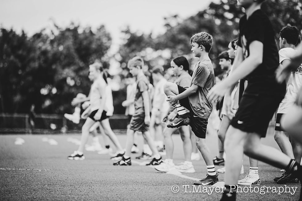 Pittsburgh area athletes warming up at Speed and Agility Training event with Earn the Edge Performance, Pittsburgh's top athlete training program.