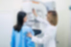 young-woman-is-having-mammography-examination-hospital-private-clinic-with-professional-fe