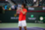 Taylor Frits wins the 2022 BNP Paribas Open and kisses his trophy. Defeating Rafael Nadal in his fir