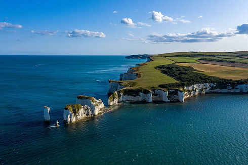 Isle-of-Purbeck-Travel-Guide-Old-Harry-Rocks-scaled.jpeg