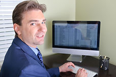 Man at computer 176k.jpeg