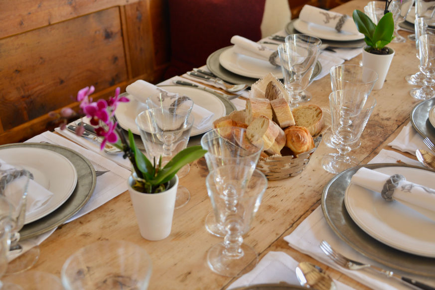 Chalet rosiere luxury dining table elegant table decoration with fresh french bread and wine glasses