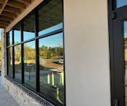 Commercial storefront glass system installed by Chasteen G&M on a commercial building exterior