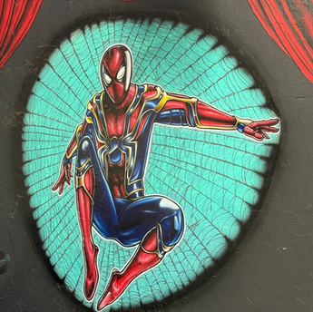 Colorful Spider-Man mural painted inside Hillie’s Artwork tattoo studio in Gladewater, Texas.