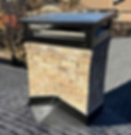 Completed chimney repair with new chimney cap and flashing on asphalt shingle roof