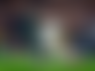 City's Jeremy Doku and Madrid's Raul Asencio battle for the ball.