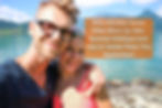 Smiling couple poses by a lake with mountains. Text reads: "Why Intimacy Issues Show Up After Summer Holidays (and How to Tackle Them This September)."