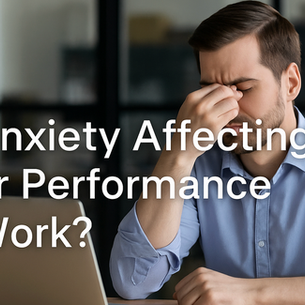 Man in a blue shirt sitting at a desk, holding his head in frustration. Text reads "Is Anxiety Affecting Your Performance at Work?"