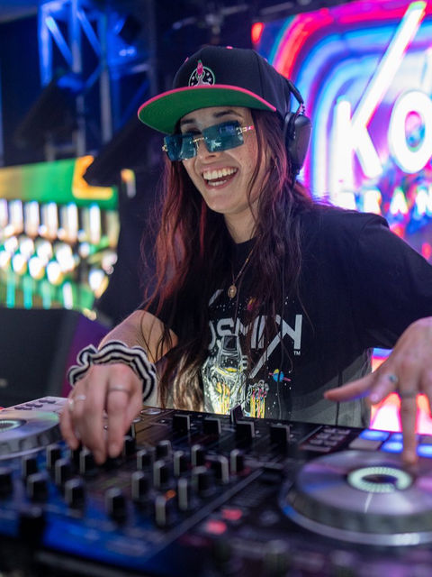 Professional event photography of young female DJ