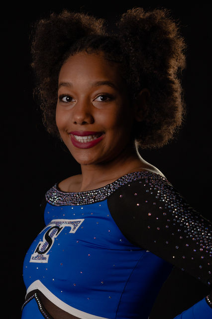 Professional headshot of a young female gymnast