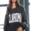 Miniaturbild: Oklahoma Babe | Oversize Charcoal Graphic Sweatshirt