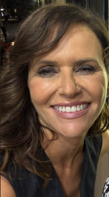 Amy Landecker smiling outside the Lower East Side Film Festival
