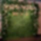 8x8 greenery wall with added leaves and silk flowers (1).jpeg