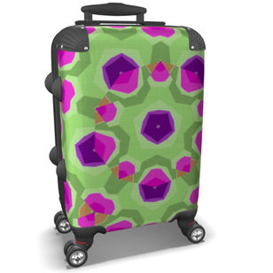 Bold geometric textile print
design on a travel suitcase
