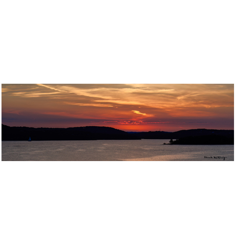Crimson Twilight Over Tranquil Waters