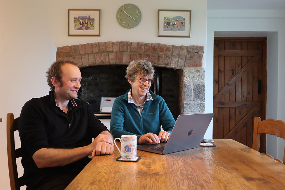 Farm staff look over their training options on the TIAH Learning Hub.