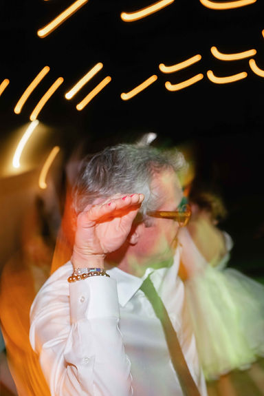 Guest dancing in this cool photo using a shutter drag technique.