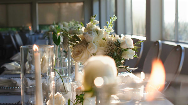 Stunning reception tables decorated with elegant centerpieces at Wrigley Mansion, Phoenix.