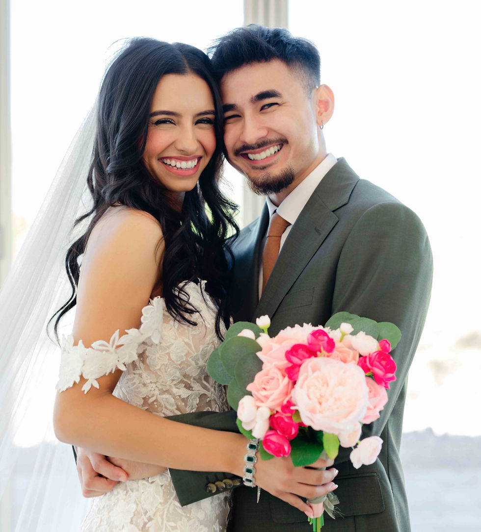 Couple smiling and laughing together for portraits at desert view events.